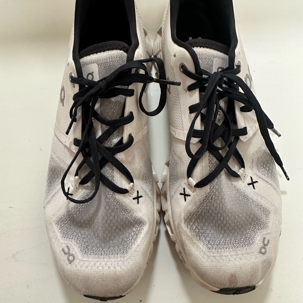 On Running Cream and Black Athletic Shoes
Women’s 11
Small stain on the toe